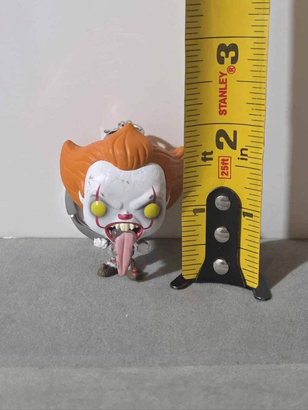 Pennywise tongue out pocket pop funko keychain